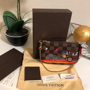 Authentic Louis Vuitton LE Evasion mini POCHETTE
